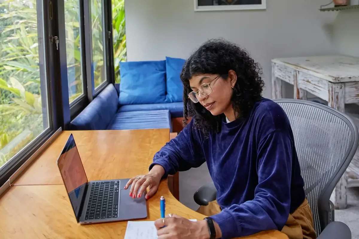 Homeowner reviewing her renewal online